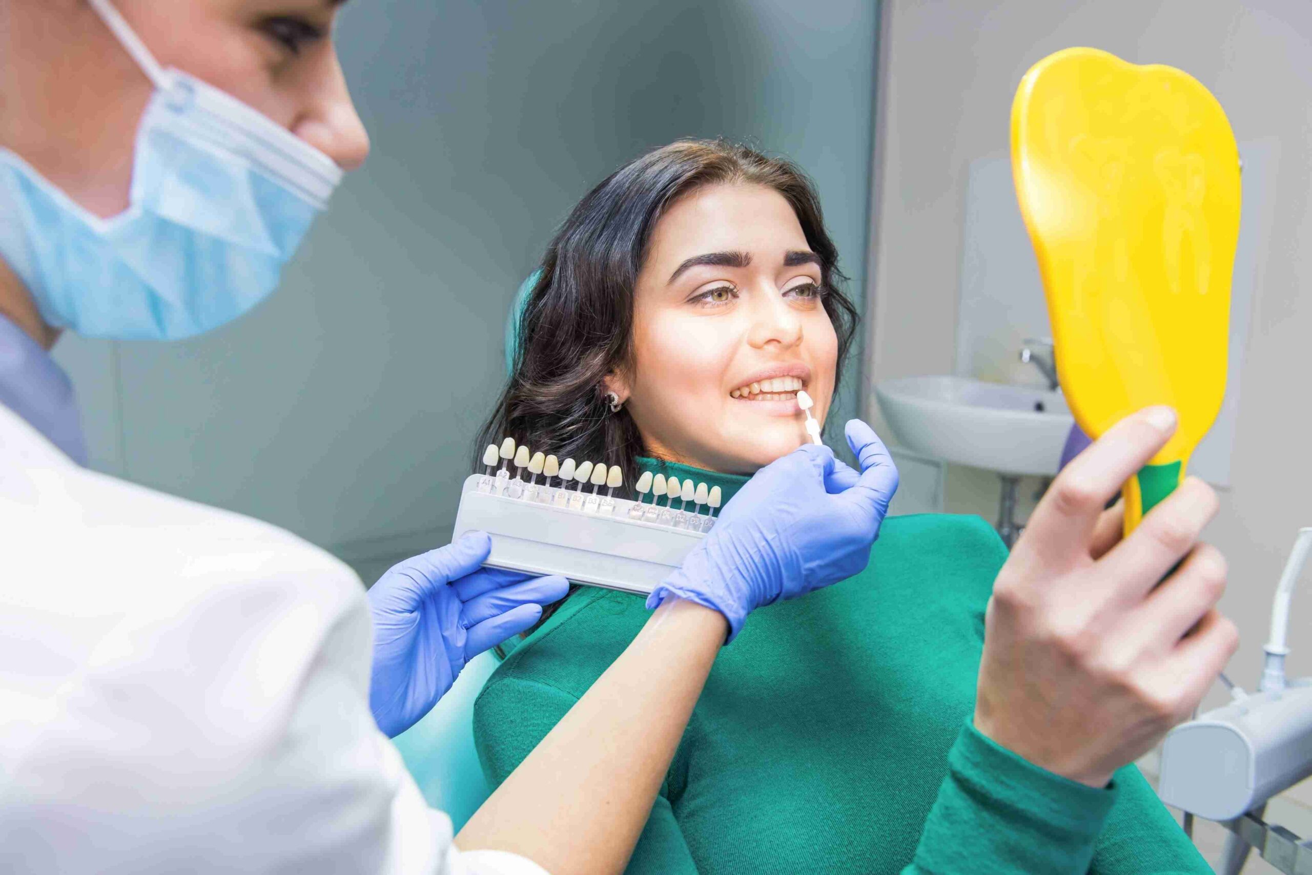 Patient matching tooth shade for a cosmetic dental treatment.